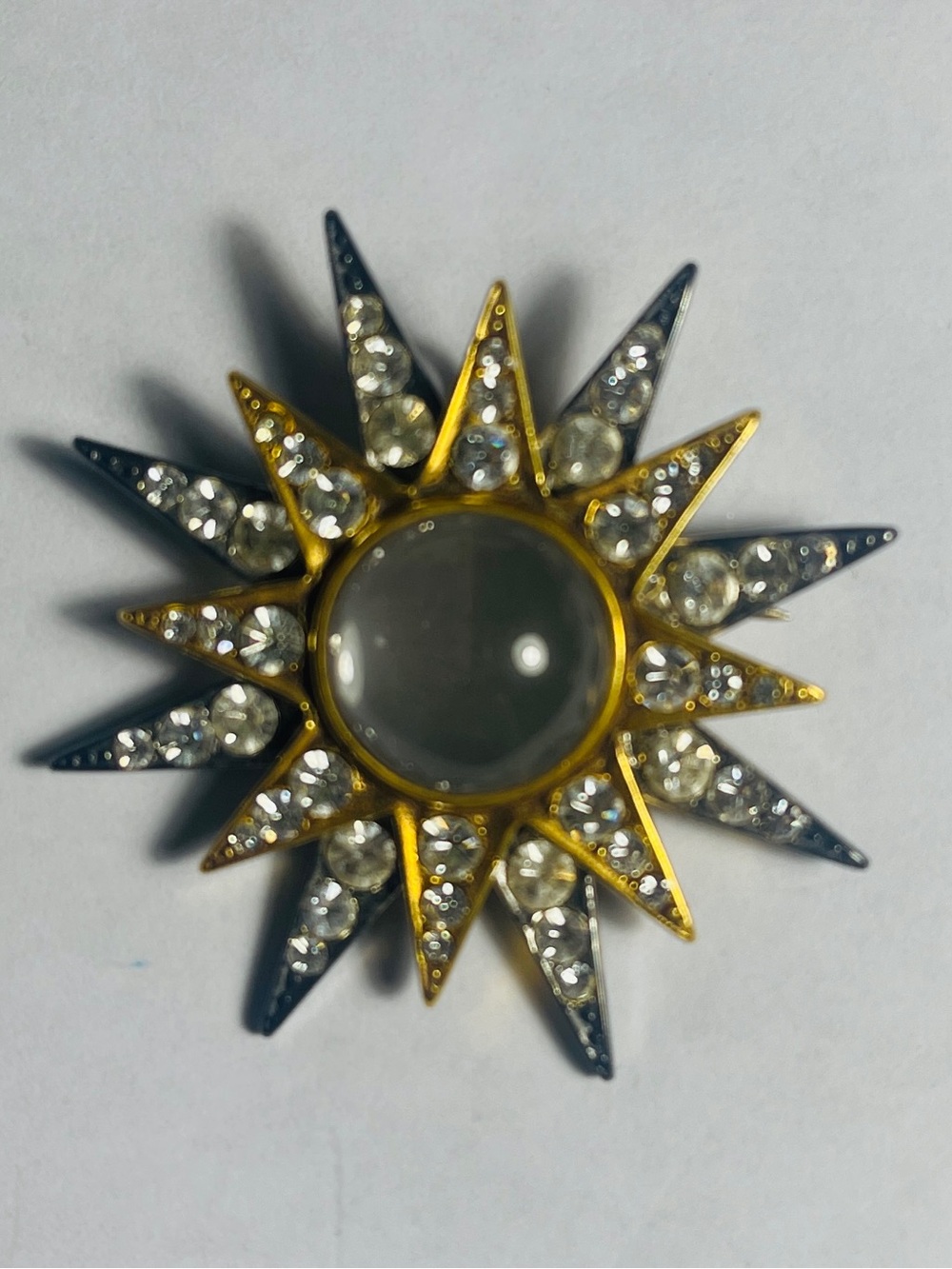 MMA MMd Sunburst Crystal Starburst Brooch-pendant in Gold and Silver Tones